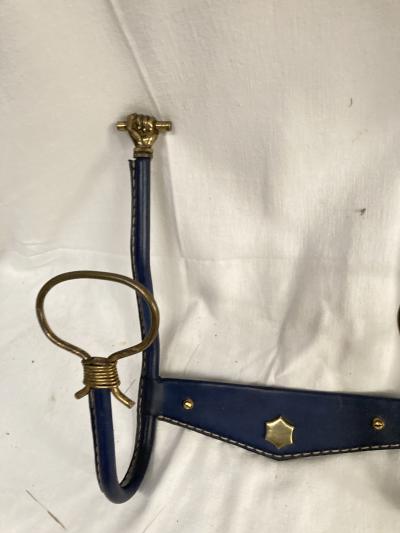 Jacques Adnet 1950s stitched leather and brass coat rack by Jacques adnet