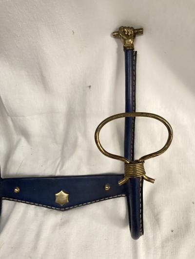 Jacques Adnet 1950s stitched leather and brass coat rack by Jacques adnet