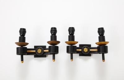 Jacques Adnet A Pair of Double Arm Sconces in Brass and Black Leather