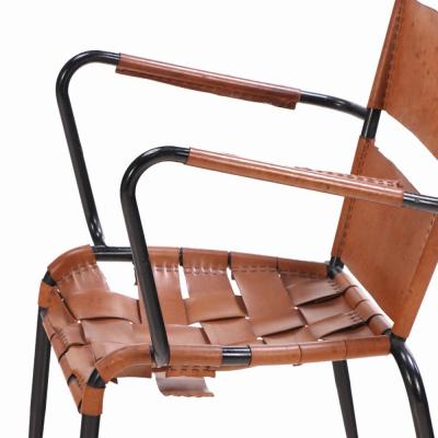 Jacques Adnet A Pair of French iron leather armchairs in manner of Jacques Adnet C 1950 