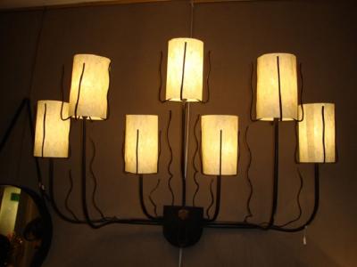Jacques Adnet A pair of 1950 s wall lights by Jacques Adnet