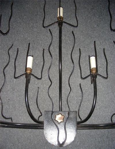 Jacques Adnet A pair of 1950 s wall lights by Jacques Adnet