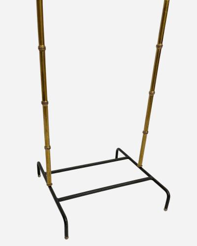 Jacques Adnet Night valet in turned brass and black leather by J Adnet France circa 1950