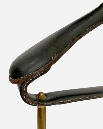 Jacques Adnet Night valet in turned brass and black leather by J Adnet France circa 1950