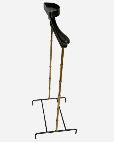Jacques Adnet Night valet in turned brass and black leather by J Adnet France circa 1950