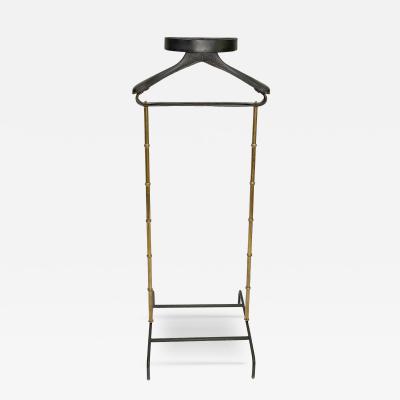 Jacques Adnet Night valet in turned brass and black leather by J Adnet France circa 1950