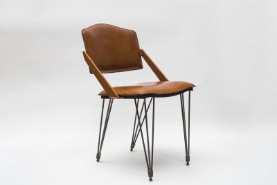 Jacques Adnet Pair Of Stitched Leather Armchairs By Jacques Adnet