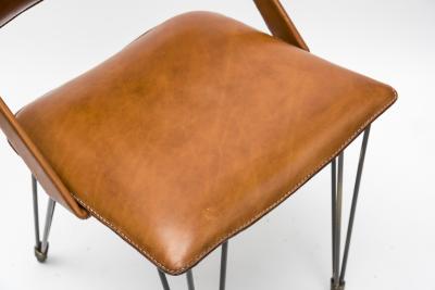 Jacques Adnet Pair Of Stitched Leather Armchairs By Jacques Adnet