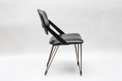 Jacques Adnet Pair oStitched Leather armchairs by Jacques Adnet