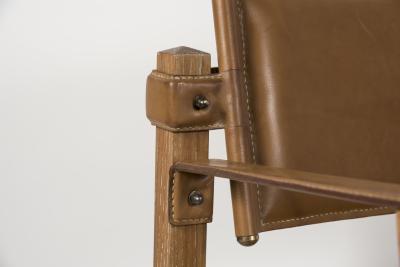 Jacques Adnet Pair of 1950s Stitched Leather armchairs By Jacques Adnet