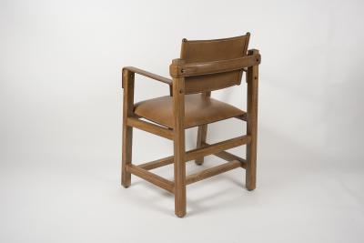 Jacques Adnet Pair of 1950s Stitched Leather armchairs By Jacques Adnet