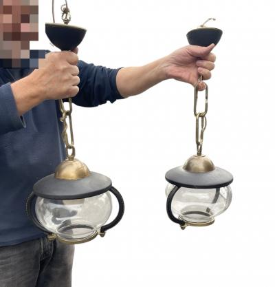 Jacques Adnet Pair of 1950s Stitched leather lanterns by Jacques Adnet