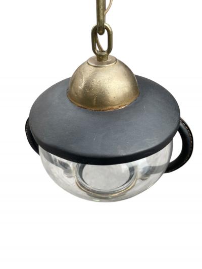 Jacques Adnet Pair of 1950s Stitched leather lanterns by Jacques Adnet