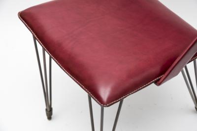 Jacques Adnet Pair of Stitched Leather armchairs By Jacques Adnet