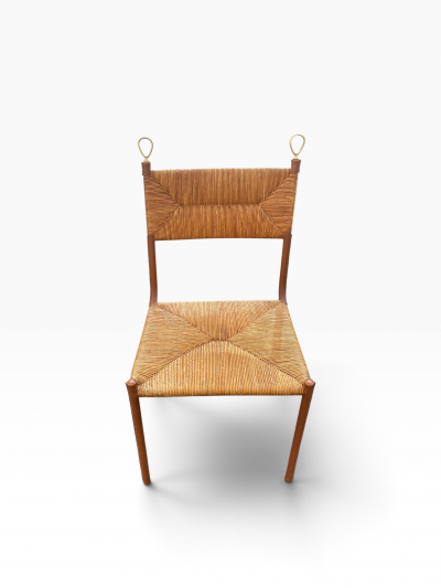 Jacques Adnet Pair of Stitched leather and rattan chairs by Jacques ADNET