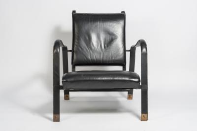 Jacques Adnet Pair of Stitched leather armchairs by Jacques adnet