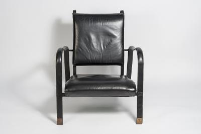 Jacques Adnet Pair of Stitched leather armchairs by Jacques adnet