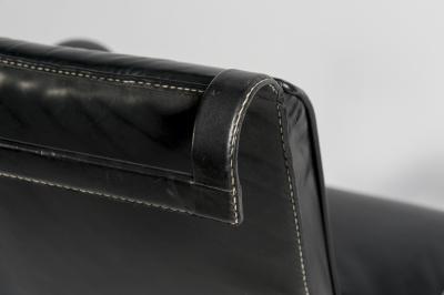 Jacques Adnet Pair of Stitched leather armchairs by Jacques adnet