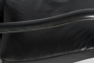 Jacques Adnet Pair of Stitched leather armchairs by Jacques adnet