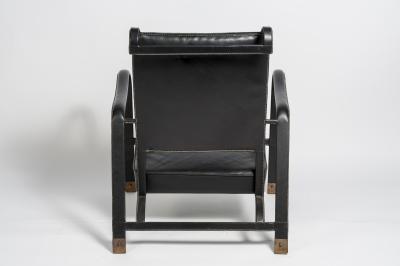 Jacques Adnet Pair of Stitched leather armchairs by Jacques adnet