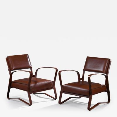 Jacques Adnet Pair of elegant armchairs