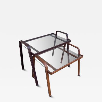 Jacques Adnet Set of two Stitched leather nesting tables by Jacques Adnet