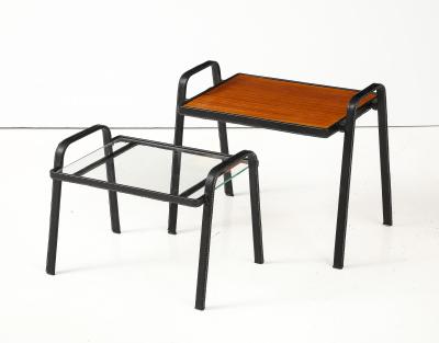 Jacques Adnet Set of two stitched leather nesting tables by Jacques Adnet