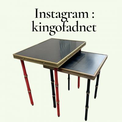 Jacques Adnet Set of two stitched leather nesting tables by Jacques Adnet