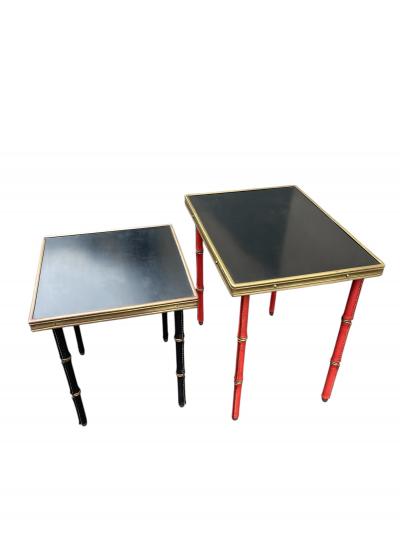 Jacques Adnet Set of two stitched leather nesting tables by Jacques Adnet
