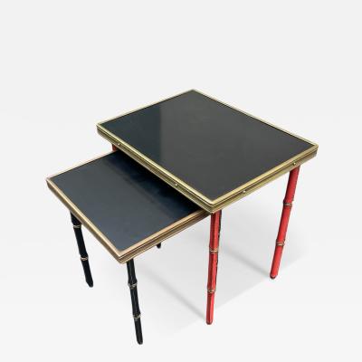 Jacques Adnet Set of two stitched leather nesting tables by Jacques Adnet