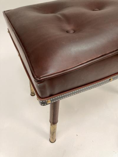 Jacques Adnet Stitched leather Ottoman by Jacques Adnet