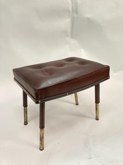 Jacques Adnet Stitched leather Ottoman by Jacques Adnet