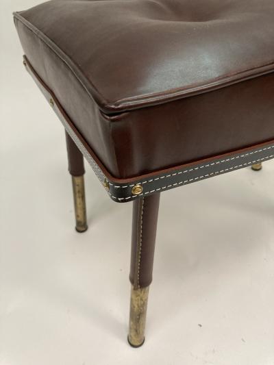 Jacques Adnet Stitched leather Ottoman by Jacques Adnet