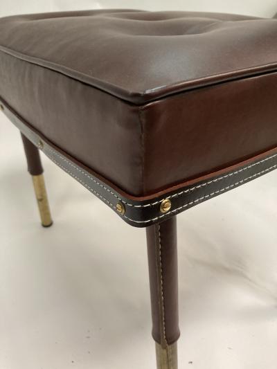 Jacques Adnet Stitched leather Ottoman by Jacques Adnet