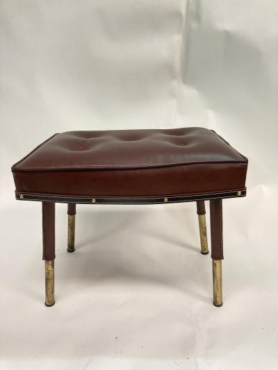 Jacques Adnet Stitched leather Ottoman by Jacques Adnet