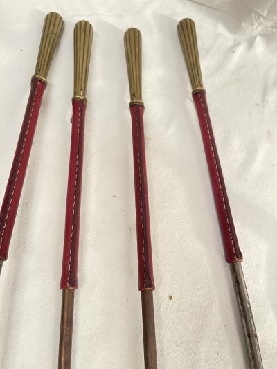 Jacques Adnet Stitched leather and bronze fire stools by Jacques Adnet