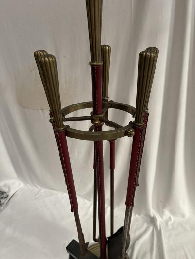 Jacques Adnet Stitched leather and bronze fire stools by Jacques Adnet