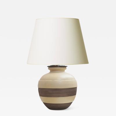 Jacques Adnet Table lamp with sculpted form by J Adnet