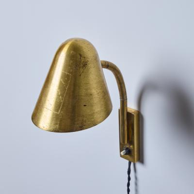 Jacques Biny 1950s Jacques Biny Brass Articulating Wall Lamp