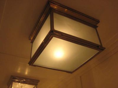 Jacques Quinet Four Large Brass Fixtures in the Manner of Jacques Quinet