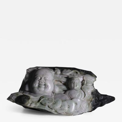 Jade sculpture with buddha and child