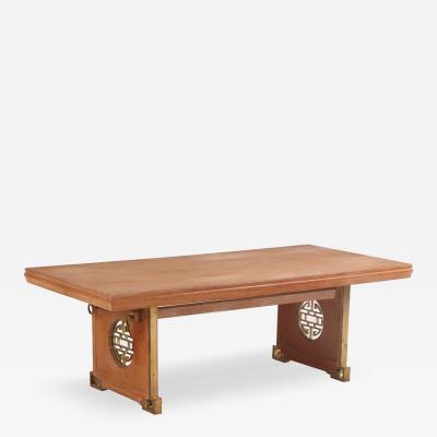 James Mont A mahogany and bronze dining table in the manner of James Mont C 1950 