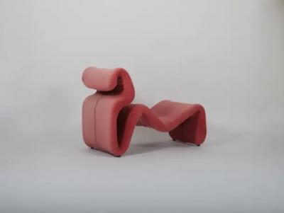 Jan Ekselius A set of two Etcetera lounge chairs with an ottoman by Jan Ekselius Sweden c1970