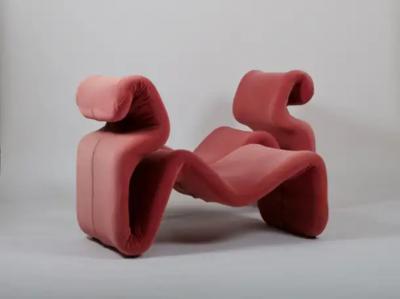 Jan Ekselius A set of two Etcetera lounge chairs with an ottoman by Jan Ekselius Sweden c1970