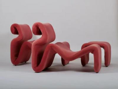 Jan Ekselius A set of two Etcetera lounge chairs with an ottoman by Jan Ekselius Sweden c1970