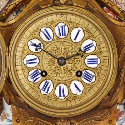 Japanese Imari porcelain and gilt bronze clock set