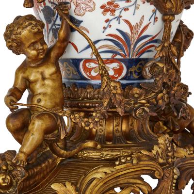 Japanese Imari porcelain and gilt bronze clock set