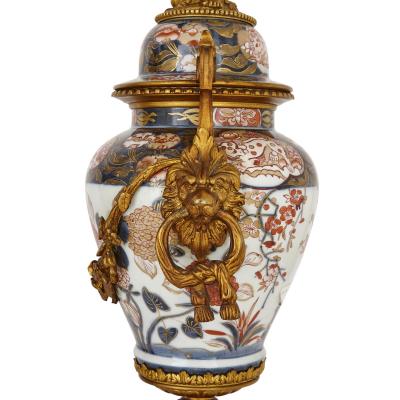 Japanese Imari porcelain and gilt bronze clock set