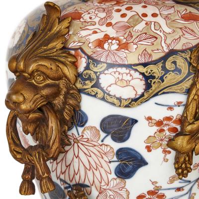 Japanese Imari porcelain and gilt bronze clock set