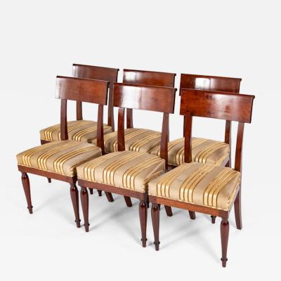 Jean Baptiste Boulard A Rare Set of 12 Restauration Empire Dining Chairs of Classic Design